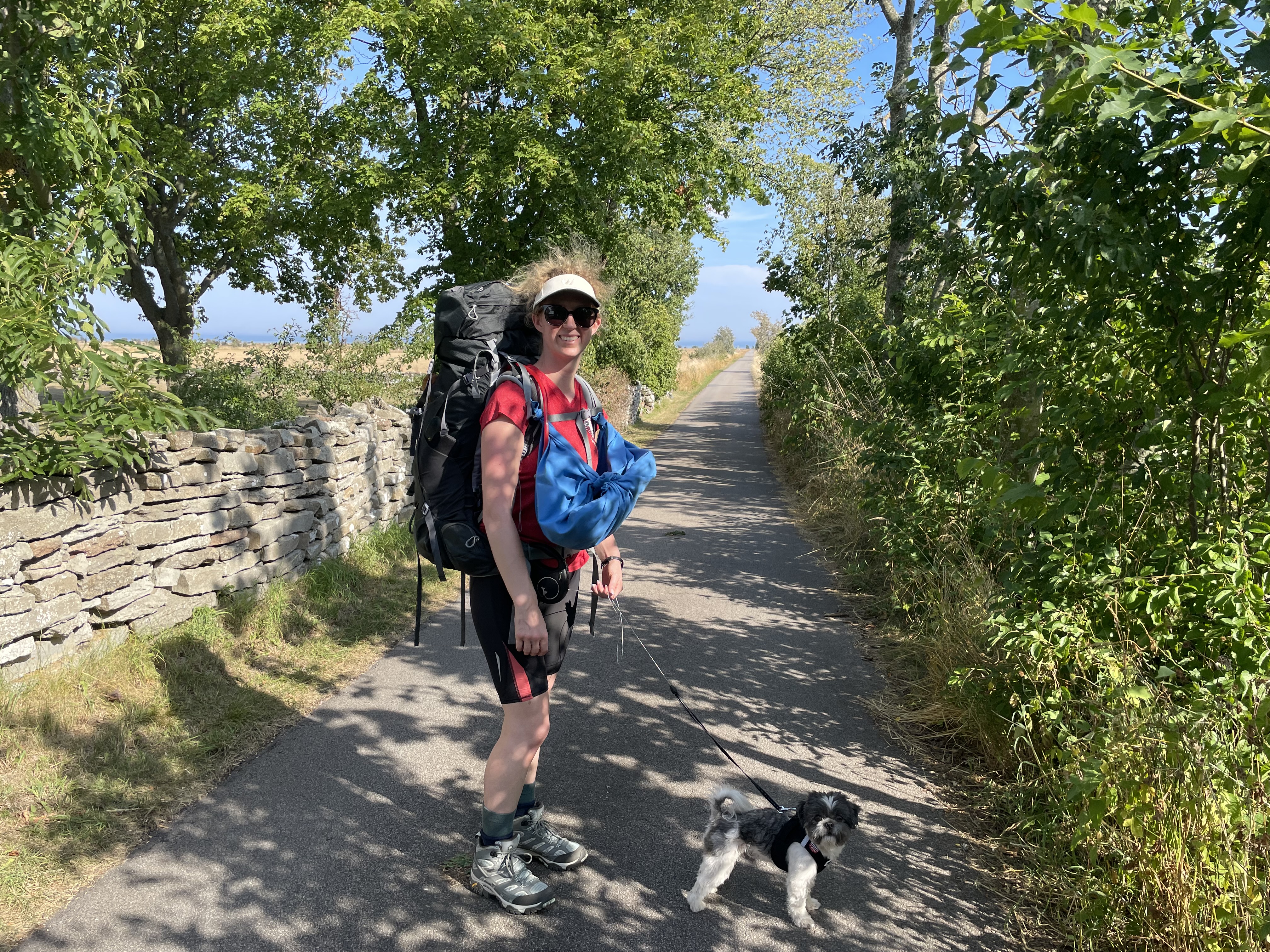 Kelsi hiking with the dog